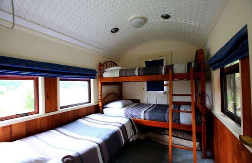 Waitomo Caves Casa | Waitomo Express - 1918 Vagón de tren Cambiar listado Vista previa listado