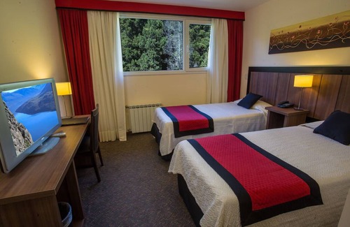 San Carlos de Bariloche Hotel | Wake to Breathtaking Garden Views Near City Center, Steps from Nahuel Huapi Lake