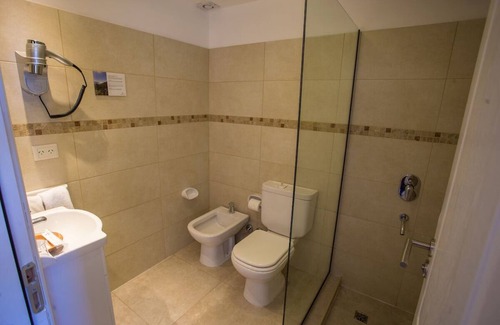 San Carlos de Bariloche Hotel | Wake to Breathtaking Garden Views Near City Center, Steps from Nahuel Huapi Lake