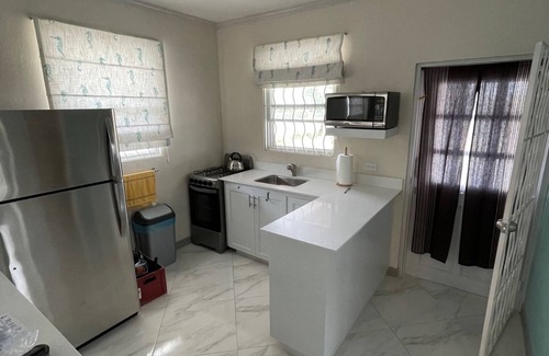 Atlantic Shores Cabaña | Walk to Freights Bay surfing & Miami Beach with golfing nearby!