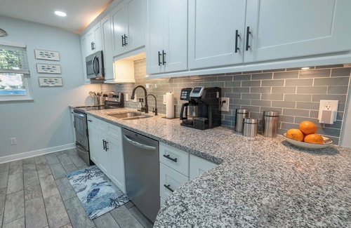 Latana Oceanfront Condominio | WALK to the BEACH!! Hip 2-bedroom/2 bath island condo in Indian Harbour Beach