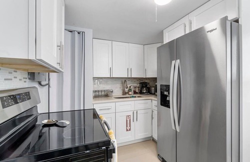 Dolphin Isles Apartamento | Walk To The Beach | Fire pit + Pool | Coconut Unit