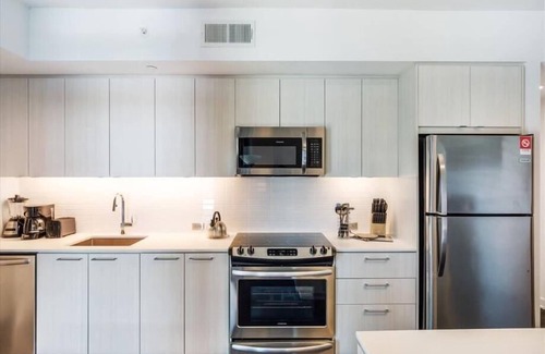 Reston Apartamento | Acogedor apartamento de 2 dormitorios en el centro de Reston con comodidades exclusivas