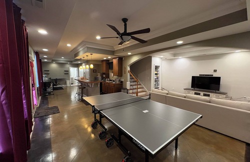 Raleigh Apartamento | Walkout Basement apartment with a private entrance facing a wooded backyard.