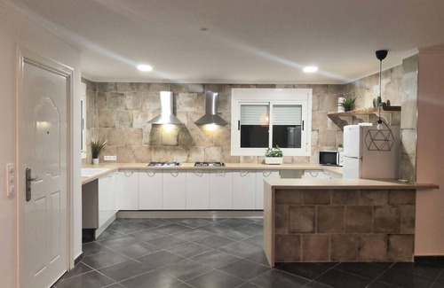 Busot Villa | Water Slide, Beer Tap, Games Room, Play Park, 2 Kitchens – Space & Fun!
