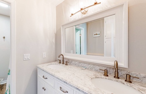 Perdido Key Coves One Casa | Water-view home with balcony & boat dock & tennis court access