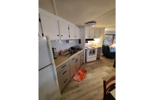 Satsuma Cabaña | Waterfront Boat House updated mobile home - Work & Fish on 50 ft. Dock and slips