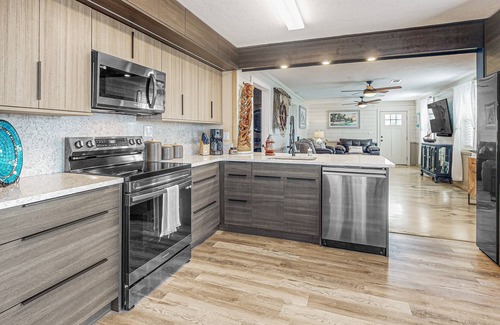 Satsuma Casa | Waterfront charmer with two docks, boat ramp, office, & gourmet kitchen