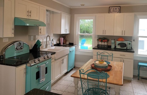 Colonial Beach Casa | Waterfront Coastal Farmhouse, Private Pier, Fire Pit with Separate Bunk House