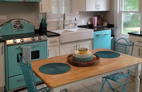 Colonial Beach Casa | Waterfront Coastal Farmhouse, Private Pier, Fire Pit with Separate Bunk House