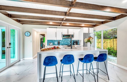 Coral Ridge Villa | Waterfront Compound / 2 Heated Pools / SaltAire & Lime Keys