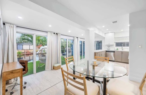 Melaleuca Gardens Casa | Waterfront Duplex Tropical Oasis