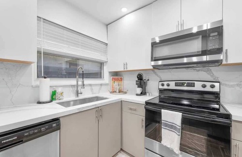 Melaleuca Gardens Casa | Waterfront Duplex Tropical Oasis