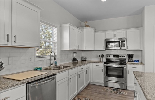 Cedar Point Casa | WATERFRONT: Fins to the Right! 4BR/2BA, private boat lift, pet friendly