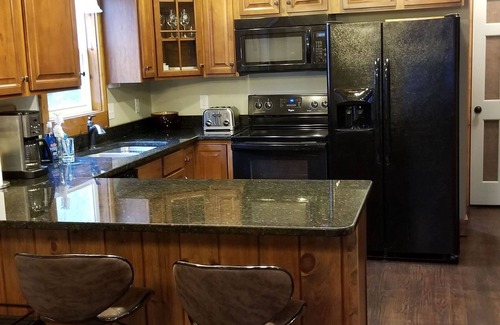 Bryson City Casa | Waterfront Home, Hot Tub, Gas Fireplace, Fire Pit, WiFi, Family & Dog-Friendly