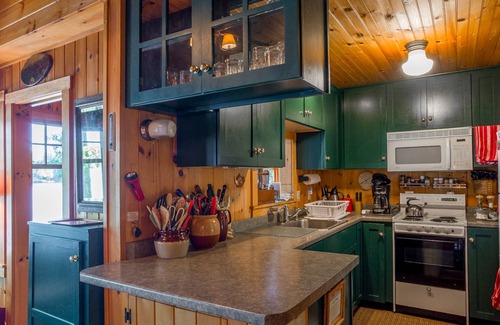 Lincolnville Cabaña | Waterfront home with pond views - dock, canoe, washer/dryer & full kitchen
