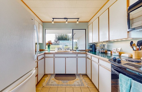 Mains Farm Casa | Waterfront home with bay and mountain views, beach access, fireplace