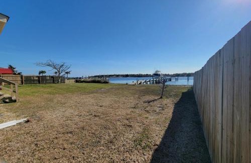 Cedar Point Casa | Waterfront home with Private Dock and swimming area, large fenced backyard