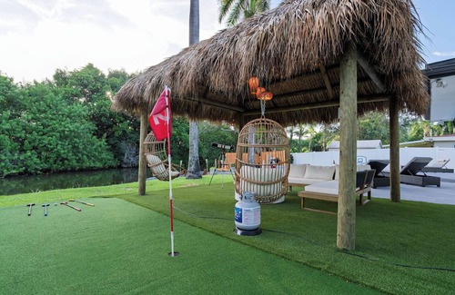 Ojus Casa | Waterfront House - Arcades, Tiki & Firepit, Golf