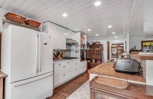 Seabeck Casa | Waterfront house & cottage with private beach, kayaks, SUPs, 4 decks - dogs OK