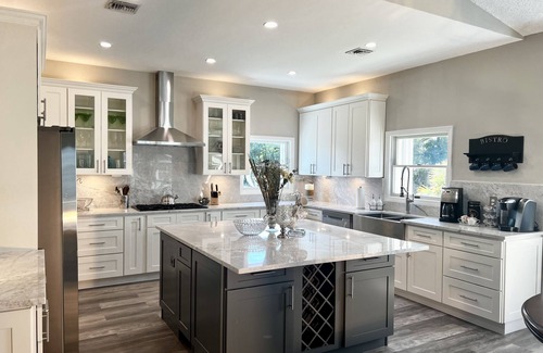 Bayshore Gardens Casa | Waterfront/Kayak with Manatees/Heated Pool/Bikes/Firepit/Fish/close to Beaches