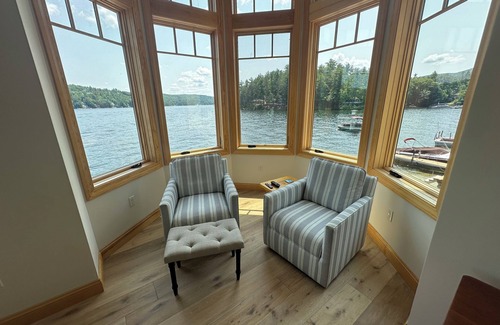 Alton Bay Casa | Waterfront New Construction 4 bedroom home w private U shaped dock Private beach