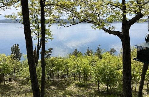 Town of Ledyard Casa | Waterfront retreat on 7 private wooded acres with beautiful sunset views.