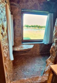 St. Joseph Casa | Waterfront Rock Shower Suite with Sunset View Room