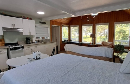 Lincoln City Cabaña | Waterfront studio cottage...just steps to the sandy shoreline of the Siletz Bay