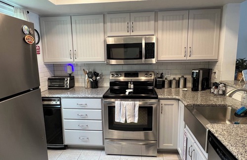 North Shore Casa | Waterfront Townhome- with Boat Slip and Dock!