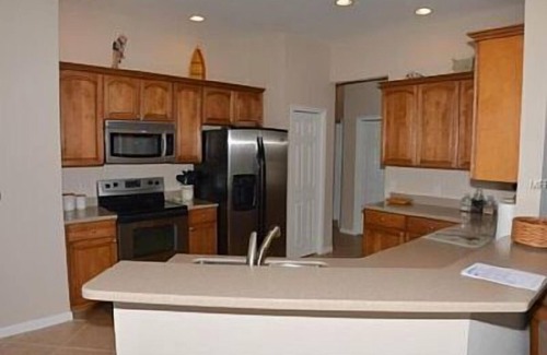 Riverwood Condominio | Opinión de la costa con piscina privada en Gated Golf Community