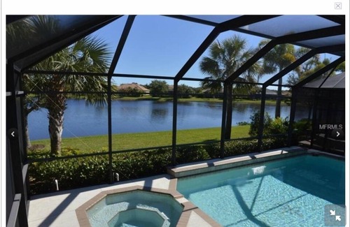Riverwood Condominio | Opinión de la costa con piscina privada en Gated Golf Community