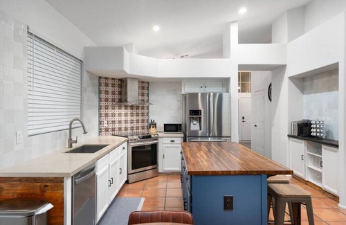 Fox Crossing Villa | Waterfront Villa with Pool Hot Tub and Lounge area
