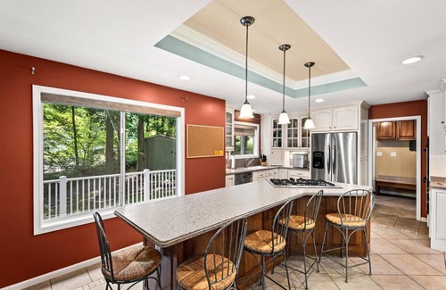 Livingston Casa | Waterfront w/ room to gather & beautiful lake views! Lakeside firepit w/ swings