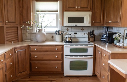 Fertility Cabaña | Waterfront with Wood Fireplace + Outdoor Firepit + Paddleboat +1 mile to outlets