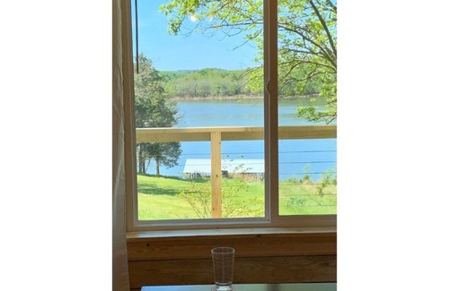 Omaha Cabaña | Water’s Edge cottage, Table Rock Lake, Golf, Branson, lakefront, Hot tub,
