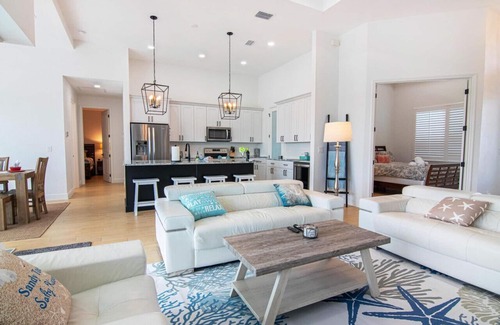 Pelican Casa | Waterside, Heated Saltwater Pool and Spa with Modern, Florida charm.