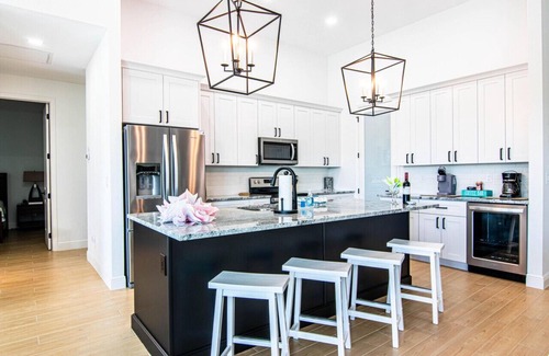 Pelican Casa | Waterside, Heated Saltwater Pool and Spa with Modern, Florida charm.