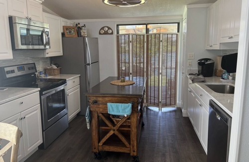 New Smyrna Beach Villa | Waterview Villa 2 Bedroom 2 Bath Minutes to Beach and Flagler & Canal Downtown