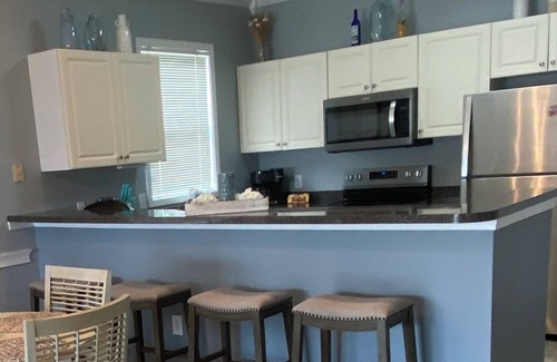 Little River Condominio | Waterway views, beautiful sunsets, pools, hot tubs, balcony, grilling & beaches