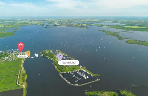 Offingawier Apartamento | Welcome in - Houseboat Earrebarre aan het Sneekermeer met dakterras, prachtig uitzicht