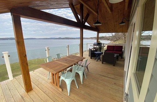 Malletts Bay Cabaña | Welcome to 54 West Lake Shore Drive, a charming, single-floor home near the peaceful shores of Lake Champlain. This 1,200-square-foot residence offers 2 bedrooms (1 King, 1 Queen), 1.5 bathrooms with a shower and soaker tub. The thoughtfully designed