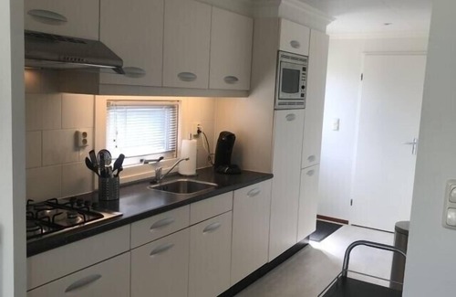 Breskens Casa | "Welcome to Chalet Huis Joschi: your dream vacation by the North Sea!"