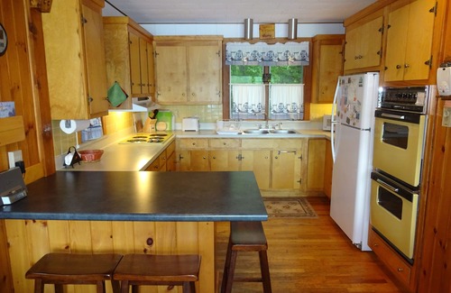 Raymond Cabina | Welcome to Dorie's Cottage! Cozy waterfront home with gorgeous sunset views!