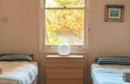 Island Beach Casa | Welcome to The Cheeky Wren, Your Ultimate Sanctuary Amidst Nature's Embrace
