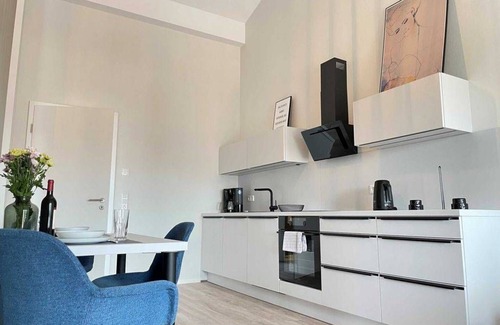 Suderneuland I Apartamento | Welcome to the exclusive Deichmühle vacation apartment in the center of Norden