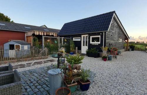 Sint-Annaland Chalet De Esquí | wellness chalet met jacuzzi, sauna, omheinde tuin,
