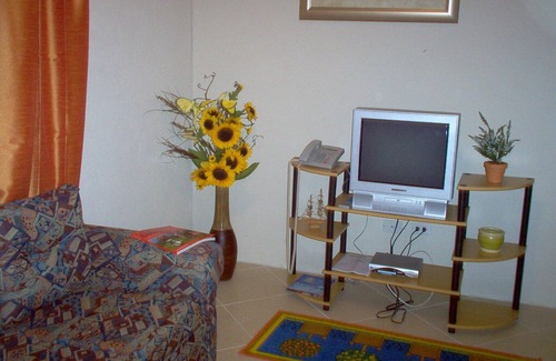 Maynards Apartamento | Apartamento en la costa oeste cerca de la playa y del puerto deportivo. Debajo de la encantadora casa familiar
