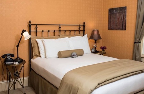 Cody Hotel | Western Charm Awaits in this Cozy Room w/ Complimentary Breakfast