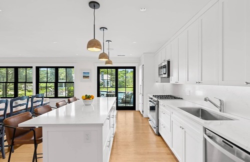 Westhampton Beach Casa | Westhampton Beach 4 bed/4 bath - large garden, heated gunite pool, dock on bay!